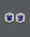 Inspire your style with a touch of royalty. B. Brilliant's stunning stud earrings feature Tanzanite-colored cubic zirconias (4-9/10 ct. t.w.) encircled by clear cubic zirconias (9/10 ct. t.w.). Crafted in sterling silver. Approximate diameter: 12 mm.