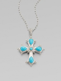 This cross of vibrant turquoise is framed in sterling silver and punctuated by luminous diamonds.Diamond, 0.15 tcw Sterling silver Pendant length, about 2½ ImportedPlease note: Chain sold separately 