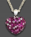 This lovely, feminine pendant from Balissima by Effy Collection features round-cut pink sapphires (1-5/8 ct. t.w.) and round-cut rubies (1-5/8 ct. t.w.) set in sterling silver. Approximate length: 18 inches. Approximate drop: 1 inch.
