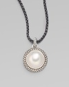 From the Mooonlight Ice Collection. A lustrous white mabe pearl sits center with a dazzling, two-row diamond surround. White mabe pearlDiamonds, 1.36 tcwBlackened sterling silverSize, about ½Imported Please note: Chain sold separately.