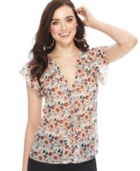 All out feminine, a floral print and ruffle trim make this Studio M top a perfect pick for a spring look!