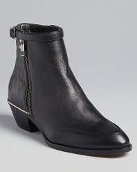 The height of luxe, the Chloé Beatle booties are the ultimate in little black booties. Stitchless quilting feels of-the-moment, while hints of metal hardware lend a shining finish.