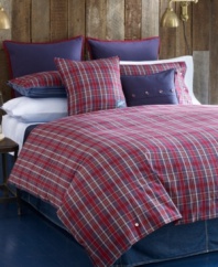 Into the plaid. A red and navy plaid pattern accented with decorative buttons embellishes this Bear Mountain duvet cover set from Tommy Hilfiger for a look of rustic charm. Reverses to navy stripes.