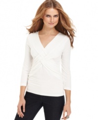 Do the twist with Cable & Gauge's braided-front top! Perfect for pairing with everything from jeans to a pencil skirt.