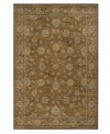With a delicate vine-and-blossom motif inspired by ancient Persian designs, this earth-toned rug from Momeni is a refreshing centerpiece for your living space. Drop-stitched polypropylene creates a highly durable pile while maintaining luxurious texture and depth.