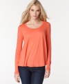 Enjoy the chill comfort of BCBGMAXAZRIA's long sleeve top, featuring a relaxed fit-- team it with your fave jeans!