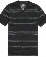 A few fine lines. This T shirt from American Rag is a streetwise take on a classic pattern.
