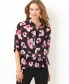 Flowers are feminine enough, but Charter Club went the extra mile on this top by adding chic three-quarter sleeves and an elastic waistband to create a flattering blouson effect.