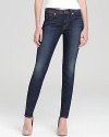 This sleek skinny silhouette from J Brand features artful fading for an authentic vintage feel.