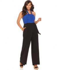 Snag one of the season's hottest styles with Spense's plus size halter jumpsuit, accented by a belted waist!