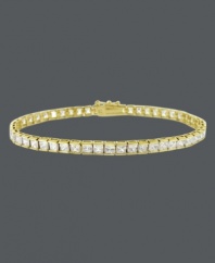 Add an element of luxury to your look with a luminous bracelet. B. Brilliant design features a row of round-cut, channel-set cubic zirconias (10 ct. t.w.) set in 18k gold over sterling silver. Approximate length: 7-1/4 inches.