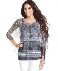 Score this luxe look from Style&co.: a paisley-printed, poncho-style top with a sheer overlay and removable opaque camisole. Pairs beautifully with bright accessories!