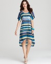 Printed in painterly stripes, this super-soft C&C California dress flaunts a high/low hem for playful movement.