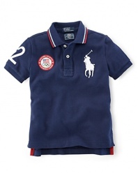 This preppy short-sleeve polo shirt in breathable cotton mesh celebrates Team USA's participation in the 2012 Olympics with the official U.S. Olympic Team logo and the Big Pony at front and London embroidery at the back.
