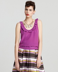 A girlish take on glamour, this kate spade new york top dresses up your classic silk top with playful ruffles and a peppy purple hue.