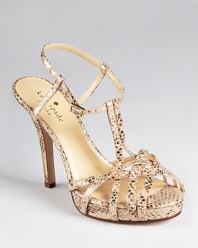 Strappy, snakeskin embossed leather makes a sassy statement on kate spade new york's Renee sandals.