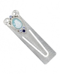 The perfect gift for the ultimate bookworm. This sentimental piece by Vatican features a blue enamel, cameo angel accented by sparkling light blue and Montana crystals. Crafted in silver tone mixed metal. Approximate length: 3 inches.