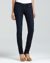 Exclusively at Bloomingdale's, exposed zip pockets toughen up these subtly faded, dark-wash DL1961 skinny jeans.