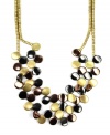 An intricate maze of color creates a statement all its own. Jones New York's unique frontal necklace features a two row design that highlights a mix of gold tone, hematite tone, and brown tone mixed metal discs, all connected together in one chic pattern. Approximate length: 17 inches.