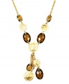 Beautiful shades of brown further enhance the elegance of Jones New York's Y necklace. Crafted in gold tone mixed metal with smokey topaz-colored plastic beads. Approximate length: 17 inches. Approximate drop: 2-1/2 inches.