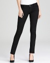 Sleek and chic, these black Aqua jeans take you anywhere in slim perfection.
