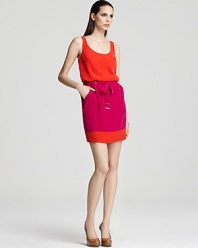 Pop-bright hues pack a punch on this Laundry by Shelli Segal color-block dress, complete with waist-cinching drawstring and comfy-chic hip pockets.