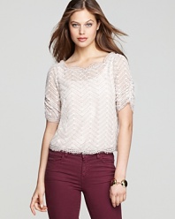 Add a dose of femininity to every ensemble with this charming Joie top, rendered in delicate eyelet silk.