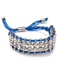 Nail this season's neon jewelry trend with woven bracelet from Aqua. Decorated with layers of crystals, this edgy piece will work just as well for day as for night.