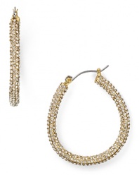 Nail this season's statement earring trend with pair of hoop earrings from ABS by Allen Schwartz, accented by delicate pave stones.