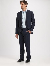 A straight-leg look that pairs perfectly with a blazer in lightweight tropical wool. Extended waist tab Fits easy through the leg Side slash, back besom pockets Inseam, about 34 96% Italian wool/4% Lycra Dry clean Made in USA 