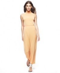 With a delicate turtleneck, slender belt and figure-skimming silhouette, this maxi dress is statuesque elegance materialized. By Francisco Costa for Calvin Klein.