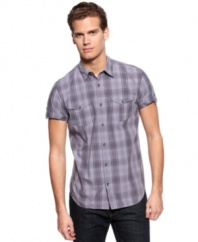 Get to work on great style by rolling up the sleeves with this plaid shirt from Calvin Klein.