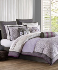 Luxurious embroidery in a soft purple recreates a traditional African-inspired design. Accents of beadwork and contrast cording create an exceptional design for contemporary bedroom décor.
