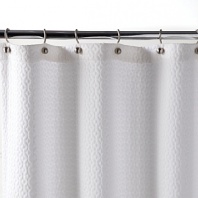 With exceptionally chic matelassé quilting, this shower curtain brings polished beauty to the bath.