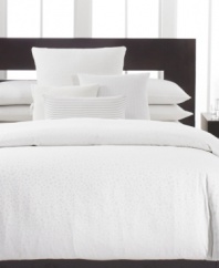 Sleep in luxury. Complement the Mykonos bedding collection from Calvin Klein with these pillowcases, featuring soft 300-thread count combed cotton percale in a dreamy cream hue.