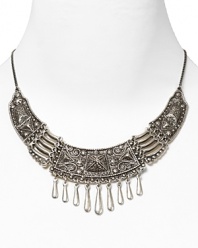 Rock the casbah with this engraved statement necklace from Vanessa Mooney. Crafted of silver plate with hanging beads, it's a perfect way to take this season's exotic influences to your jewel box.
