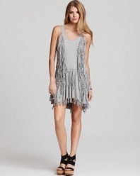 This bohemian-chic Sauce dress flaunts allover fringe for lively movement on the dance floor and beyond.