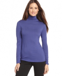 A cold-weather staple, this Calvin Klein turtleneck adds sleek stylish warmth to any outfit!