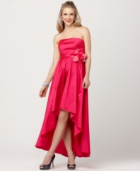 JS Collections' taffeta dress comes with an elegant surprise: a hint of leg peeking out!