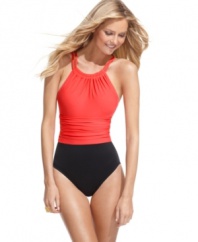 Standout seaside in this graphic colorblocked Magicsuit one-piece swimsuit featuring tummy control for a chic & sleek silhouette!
