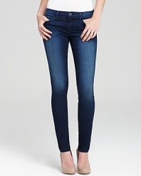 These J Brand skinny jeans flaunt a hip-hugging rise and perfectly faded wash.