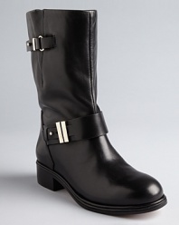 Rachel Roy takes the moto trend uptown, embellishing sleek, polished boots with elegant hardware.