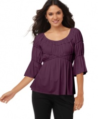 Figure-flattering and easy-to-wear this versatile top from Studio M is casual, but still work appropriate.