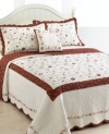 Whimsical florals in delicate embroidery cascade across crisp cotton quilting in this Silkroad bedspread. The reverse presents a rich pattern of taupe florals over burgundy ground, offering a warm color alternative for any setting.