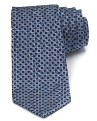 This plush silk tie balances a whimsical pattern of dots and circles with a traditional 3.5 width for a refined style that's perfect for the office or any of your dressed-up affairs.