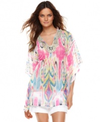Flowing and elegant meets all-out-glam: INC's ikat printed tunic gets a colorful makeover and a collar full of sparkles!