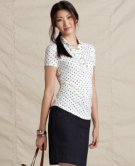 A springtime essential is enlivened by polka dots in this Tommy Hilfiger look. Pair this polo with anything from slim skirts to crisp khakis!