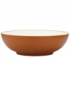 Make everyday meals a little more fun with Colorwave dinnerware from Noritake. Mix and match this round vegetable bowl in terra cotta and white with other shapes and shades for a tabletop that's endlessly stylish.