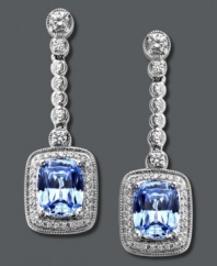Add a hint of dazzle to your evening wear. Arabella's dramatic drop earrings highlight cushion-cut blue Swarovski zirconias (8-1/4 ct. t.w.) surrounded by clear zirconias (1-1/3 ct. t.w.). Crafted in sterling silver. Approximate drop: 1-1/4 inches.