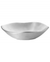 Handcrafted in aluminum alloy with an organic shape and brushed finish, the Dimension bowl from Donna Karan Lenox lends a serene, dreamy quality to modern tables.